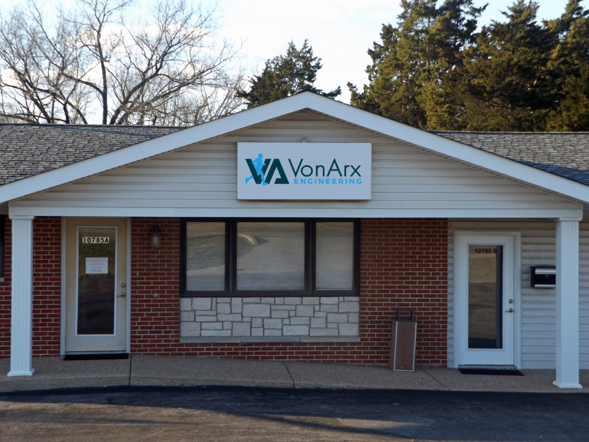 Exterior of the VonArx Engineering office with the company sign above the entrance.